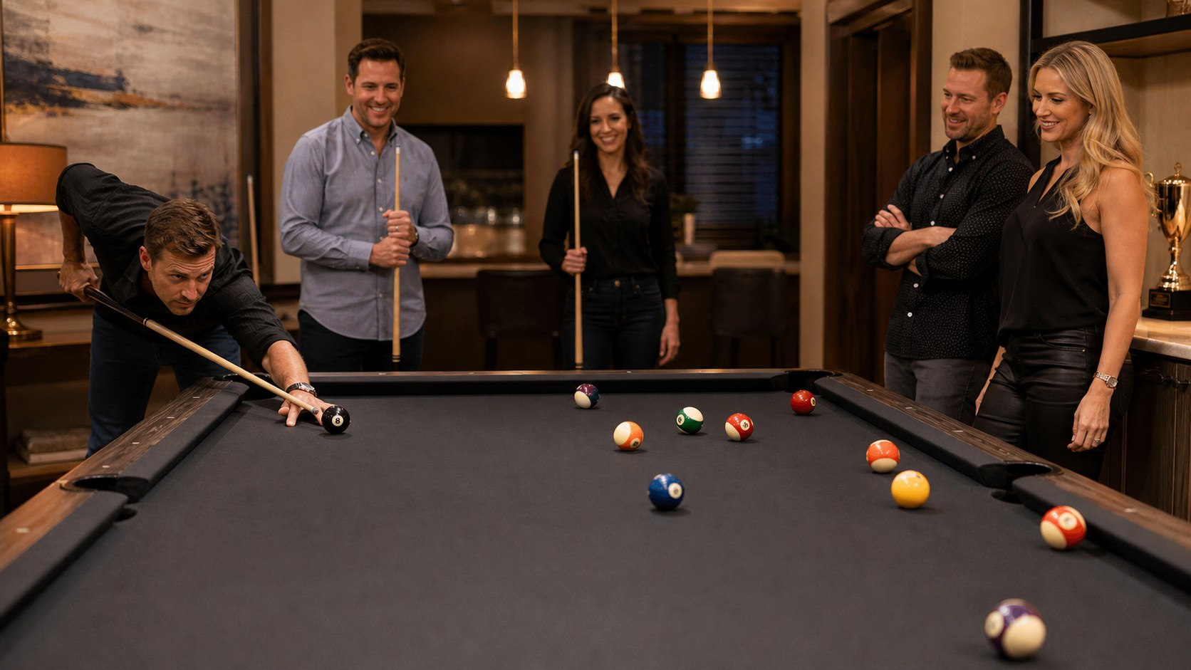 Friends watching a player line up a shot during a home billiards tournament