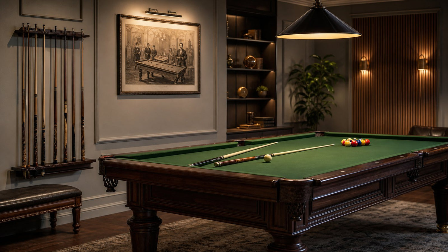 Classic pool table with vintage cues and framed billiards artwork