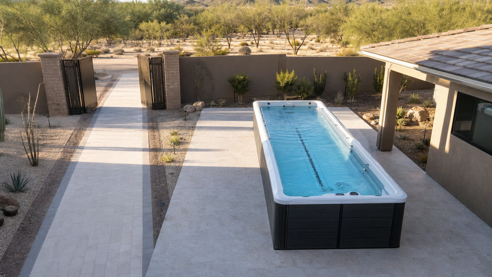 Swim spa on a level patio with a clear paved route from an open side gate